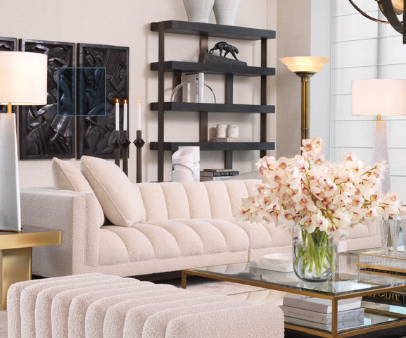 white sofas and armchairs and coffee tables