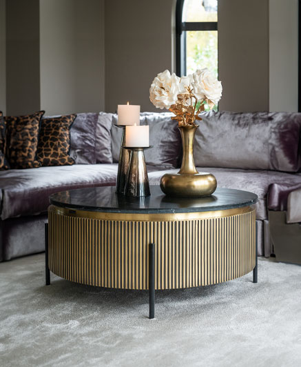 gold luxurious coffee table in an elegant living room.