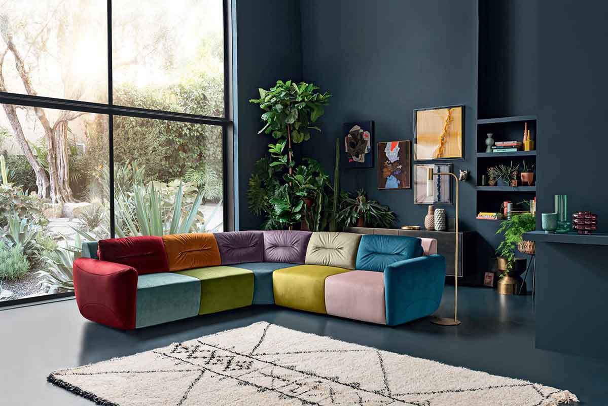 fabric grey sofa with red seams, close up fabric texture and seams colors, kontini opsi gkrizou kanape me kokkines rafes,